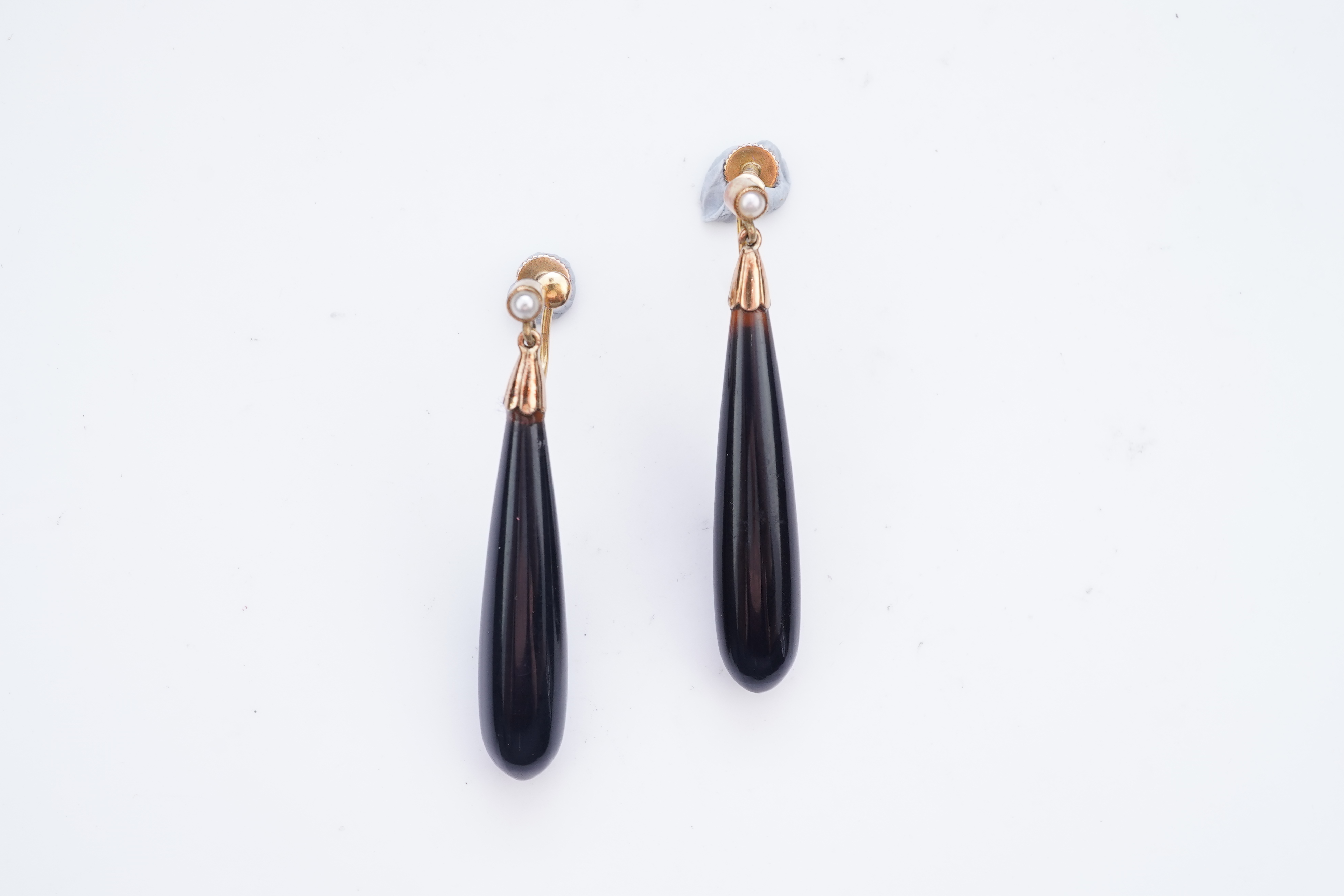 A pair of onyx and split pearl earrings, circa 1900